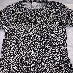 Francesca‘s black and white cheetah print top